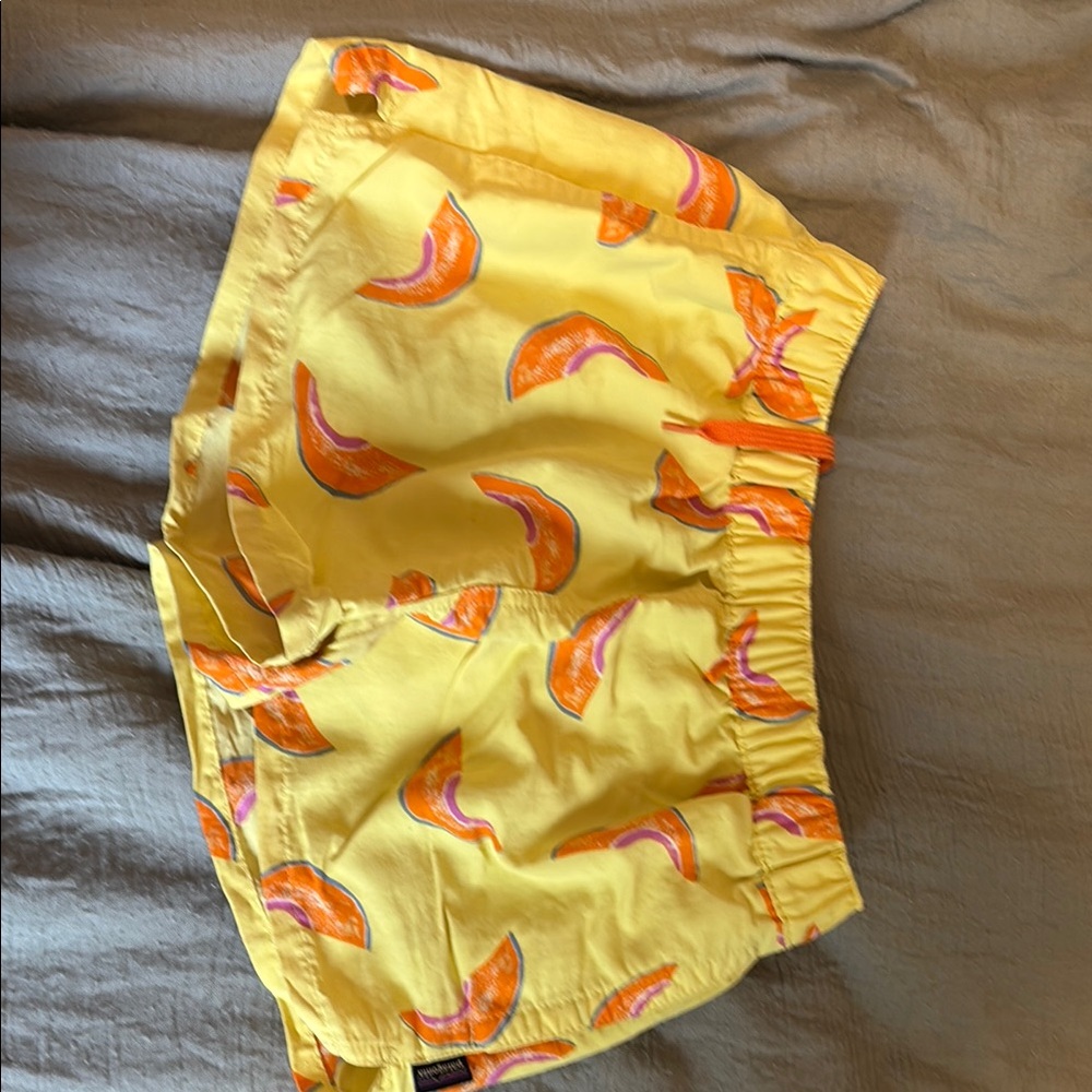 Patagonia Yellow and Orange Athletic Shorts with Playful Pattern
